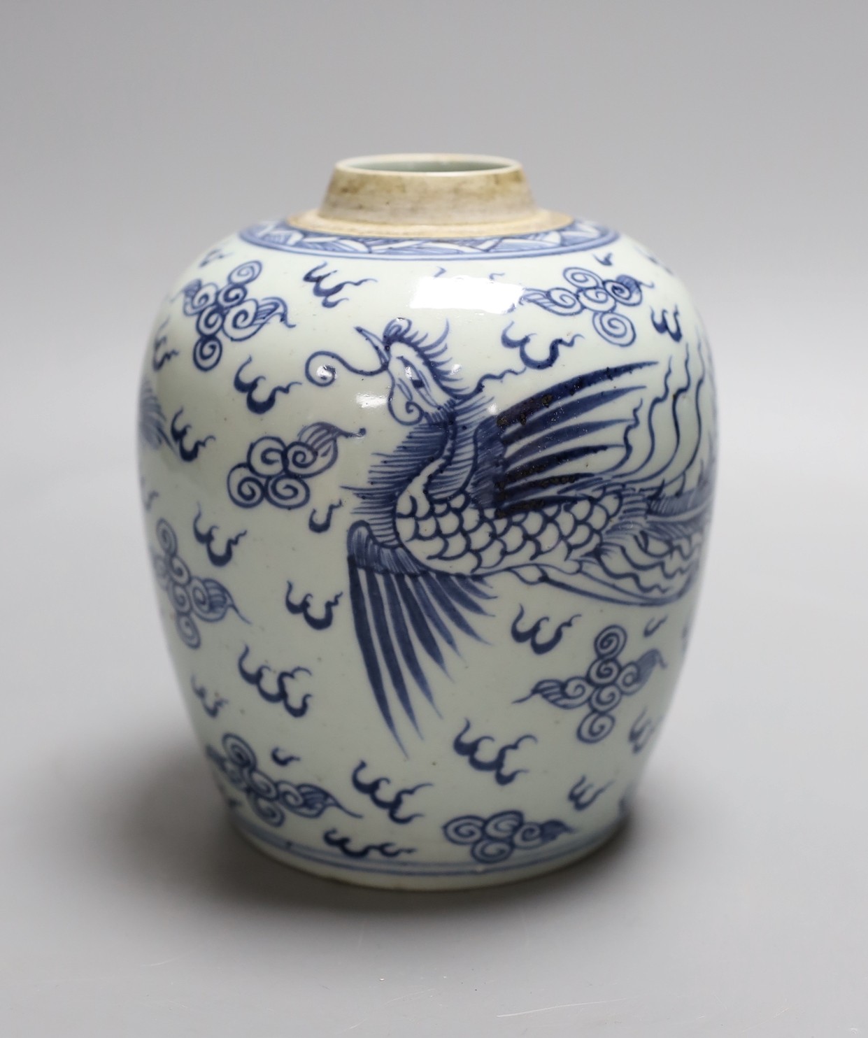 A Chinese blue and white 'phoenix' jar, 17 cms high